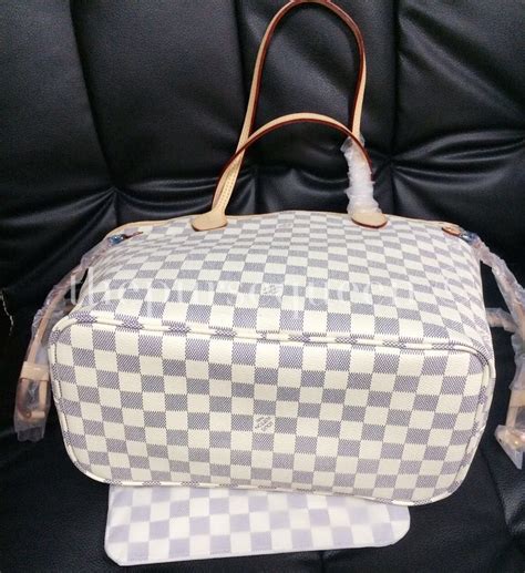 spot fake louis vuitton neverfull damier ebene|louis vuitton never full bag.